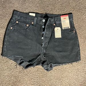 501 shorts high rise fitted though the hip